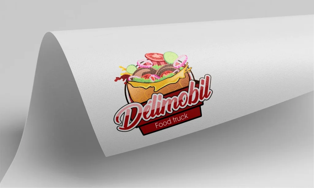 Mise en situation du logotype coloré Delimobil sur papier blanc